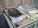 1978 Ford Bronco - Transmission parts are loaded onto a trailer for transport.