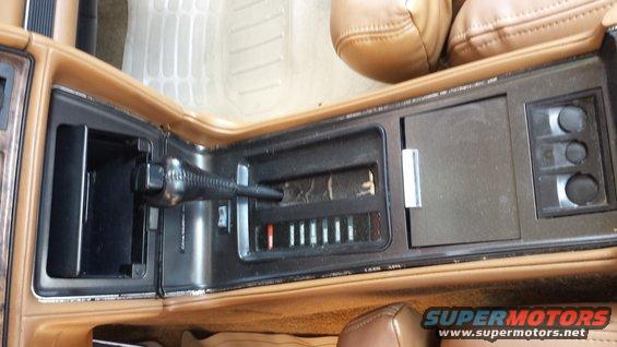Car interior center console with automatic gear shifter and climate controls