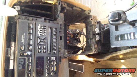 Dashboard climate controls and shifter removed from vehicle