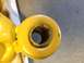 1973 Ford Bronco - Close-up view of a yellow shock absorber end, showing wear and a Supermotors.net watermark.