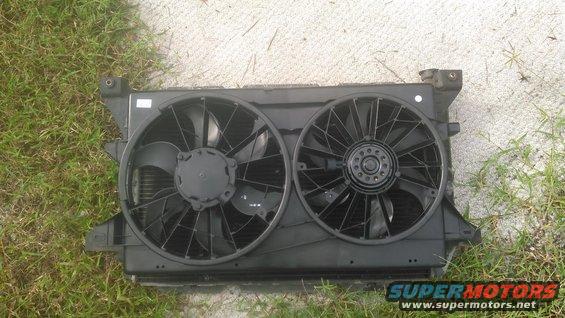 4.jpg Dual electric fans from a 04-07 Ford Freestar. its Dorman 620-144 and cost about ~120$ depending on supplier

this is on a 80-96 bronco/f-series radiator for size comparison. it coers pretty much all the finned area of the radiator and is alittle wide but can be made to work.

this is it on the front side of the radiator
