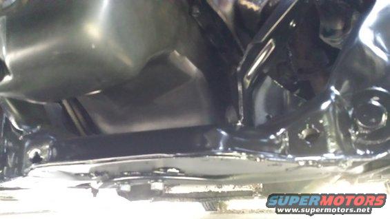 Undercarriage view of a vehicle's suspension and exhaust system