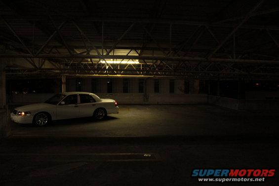 2000 Mercury Grand Marquis parked under industrial lighting