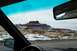 1990 Ford Bronco - Driving through a snowy desert landscape, as seen from inside the vehicle.