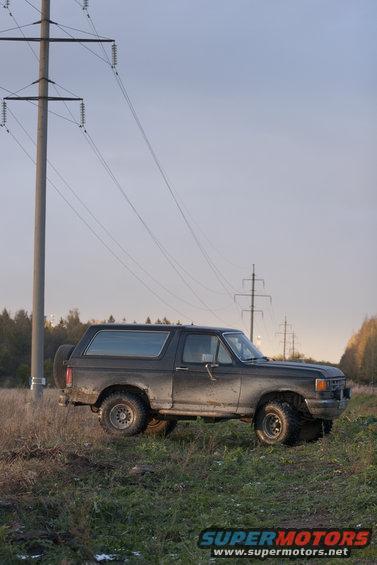 1987 Ford Bronco side view in a field