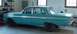 1964 Mercury Comet - This 1964 Mercury Comet sedan is seen from its rear three-quarter view in a garage setting.