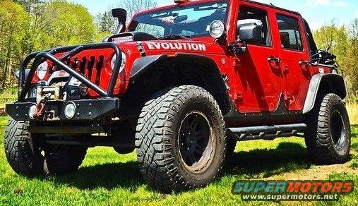 Red Jeep Wrangler with 'EVOLUTION' text and off-road tires