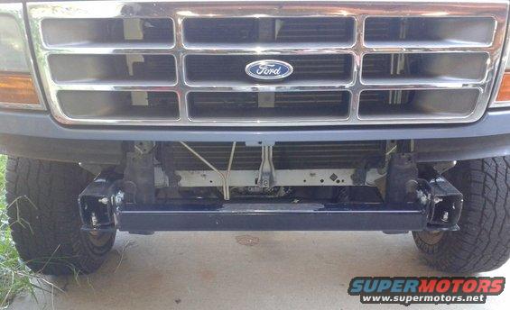 Front hitch receiver on a 1996 Ford Bronco. Grille has Ford logo