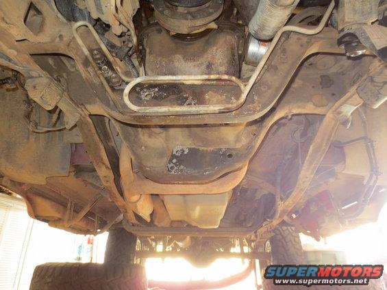 Underside view of a vehicle's drivetrain and exhaust system