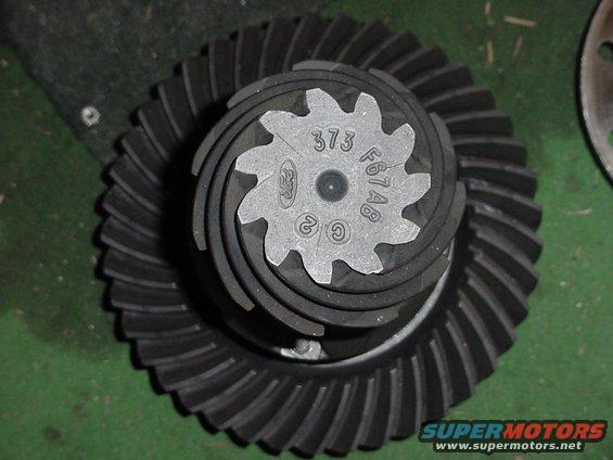 Close-up of a Ford differential gear set with markings '373' and 'F67A8'