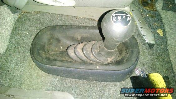 Interior view of a 4x4 gear shifter with 2H, 4H, and 4L markings