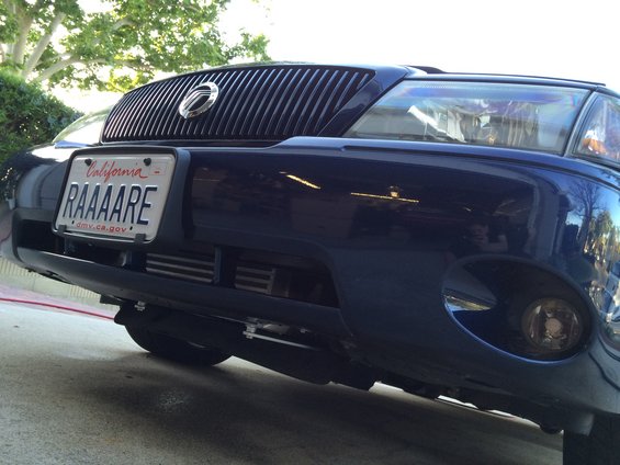 Front view of a 2003 Mercury Marauder with a California license plate reading RAAAARE