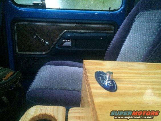 img_4600.jpg The magic key that unlocks the upper box.  I could have ordered a magnet that came with the lock but I wanted something more incognito.  Plus I got five of them from eBay for the price of one of the lock magnets.  When hidden, they look like nothing.  The Ford sticker looks nice, but is actually a target and protector when I place the magnet in position to release the catch. 