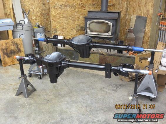 img_0204.jpg dana 60 and 14 bolt drying by the fire. I don't have many of them in the prep stages, but we had them sandblasted and my Dad shot both axles with epoxy.