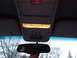 1999 Mercury Grand Marquis - Interior view of a vehicle's overhead console, illuminated lights and a rearview mirror.