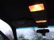 1999 Mercury Grand Marquis - Interior view of the overhead console and illuminated lights in a 1999 Mercury Grand Marquis.