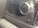 2010 Ford Ranger - The headlight assembly shows a projector lens and some condensation on the clear plastic cover.