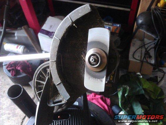 String trimmer head with visible model number NL YX666B