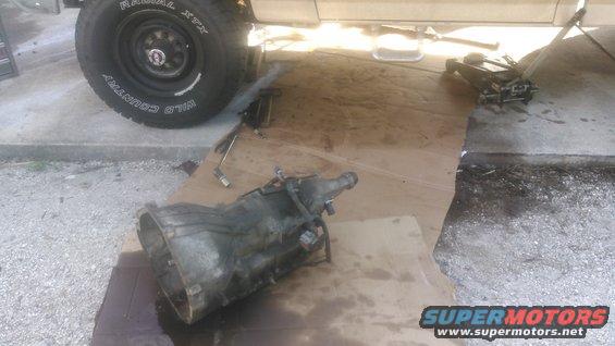 kimg0006.jpg old tranny got burned up and was permanently stuck in 2nd gear. in neutral and park it was still in gear and in reverse it cancel out each other and not move

time for a new tranny