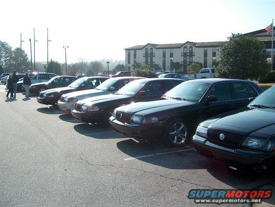 2001 Ford Crown Victoria sedans parked in a lot, front view