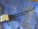 2003 Lincoln Aviator - Ford door latch actuator with cables, likely for a vehicle door mechanism.