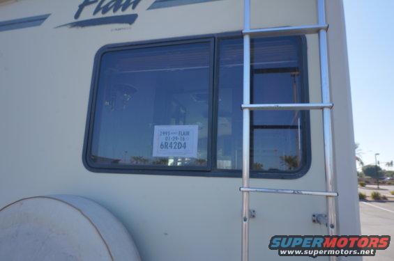 1995 Chevrolet P30 1 Ton - Step Van side view showing window, ladder, and spare tire cover