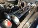 1979 Ford Bronco - Engine bay view showing two chrome air horns installed.