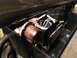 1979 Ford Bronco - Close-up view of an air horn solenoid and its associated wiring within a black housing.