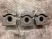 1979 Ford Bronco - Three engine bearing caps are shown, likely for a rebuild or repair project.