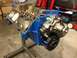 1979 Ford Bronco - Engine block on a stand, showing the water pump and pulley assembly.