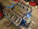 1979 Ford Bronco - The internal components of a V8 engine are visible after the valve covers have been removed.