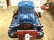 1979 Ford Bronco - Engine rebuild in progress, showing the blue painted engine block mounted on a stand.