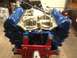 1979 Ford Bronco - V8 engine on a stand, likely undergoing rebuild or assembly.