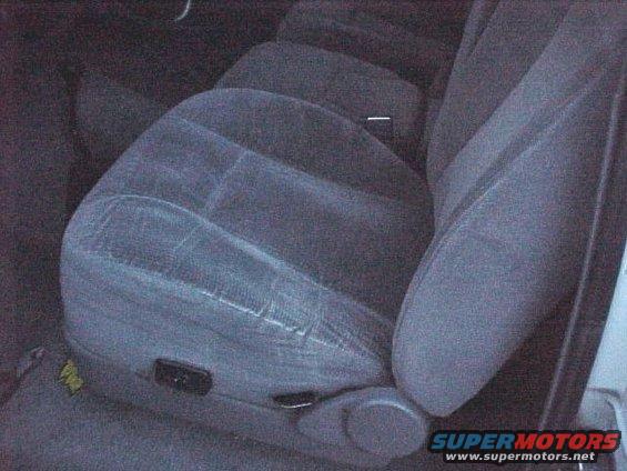 1996 Ford Bronco interior showing front seats with fabric upholstery and power seat controls