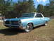 1972 Ford Ranchero - This 1963 Pontiac Bonneville coupe is a classic American car with a distinctive grille and two-tone paint.