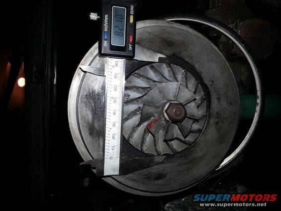 Digital caliper measuring turbocharger impeller diameter