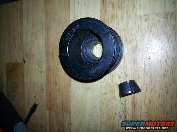 Pulley with part number 3612266 and a split wedge on wood