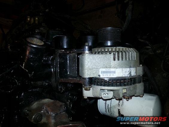 Alternator and oil filter assembly with visible part numbers