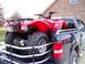1984 Honda ATC 250 R - Red ATV loaded in the bed of a dark blue Ford F-150 pickup truck.