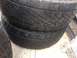 1986 Ford Bronco - A close-up view of stacked tires, showing their tread detail and sidewall construction.