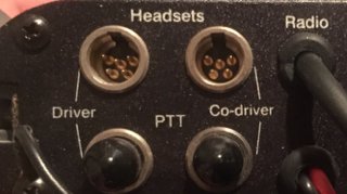 RuggedRadio Intercom panel with ports labeled Driver, Co-driver, PTT, Headsets, and Radio