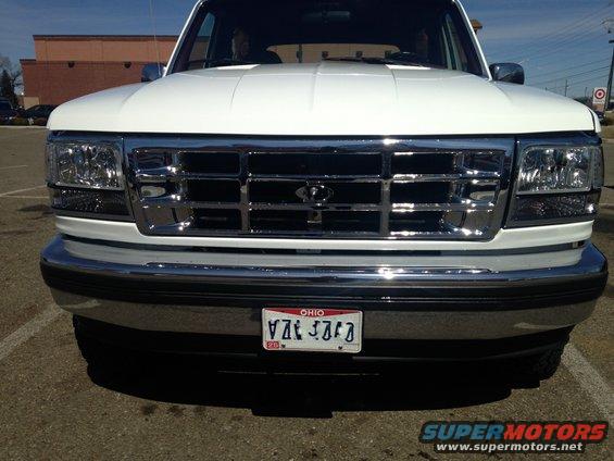 chrome grill and clear headlights