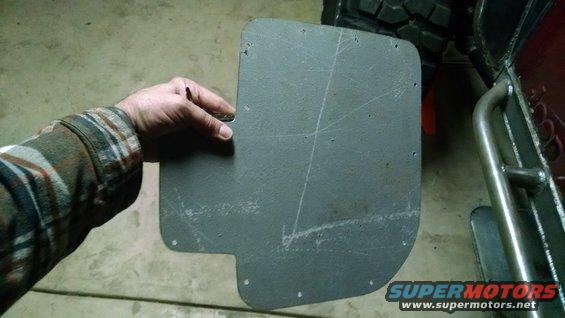 Gray mud flap with scribe lines and mounting holes