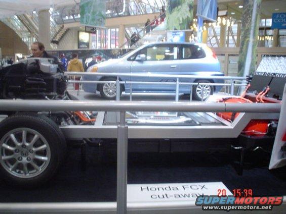 Honda FCX and in Front the FCX's Powertrain