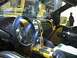 1995 Ford Bronco - Custom interior of a truck with yellow accents and a unique steering wheel.