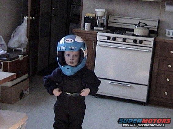 204upnorthhelmet.jpg My oldest Hunter at 3 1/2 tring on my bro's helmet before going snowmobiling.