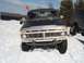 1979 Ford Bronco - This 1979 Ford F-Series truck is seen in a snowy environment with another vehicle to its right.