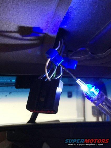 Testing wires. I decided to power the module with the key only to prevent someone from breaking the window and opening the garage when the truck is off. White/red wire. It rests at ground when the key is off.