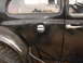 1964 Volkswagen Beetle - Close-up of the fuel door on a 1964 Volkswagen Beetle.