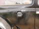 1964 Volkswagen Beetle - The fuel filler door on this classic Volkswagen Beetle appears to be original.